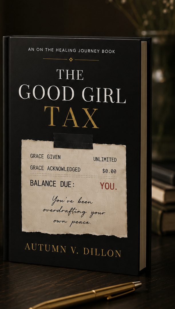 The Good Girl Tax hardcover standing on a dark wood desk beside a gold pen